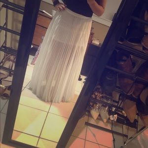Pleated white maxi skirt